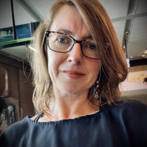 Close-up smiling woman wearing glasses